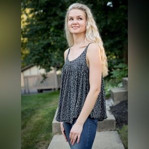 Adjustable strap tank. Black with white details. Baby doll style.